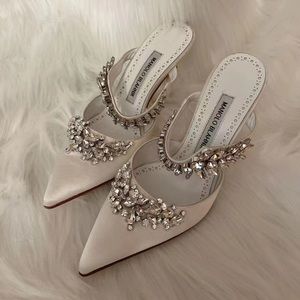 New But No Tag.  Manolo blahnik lurum embellished mules in size 36